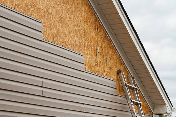 Professional Emergency Siding Repair technician working in Montross, VA